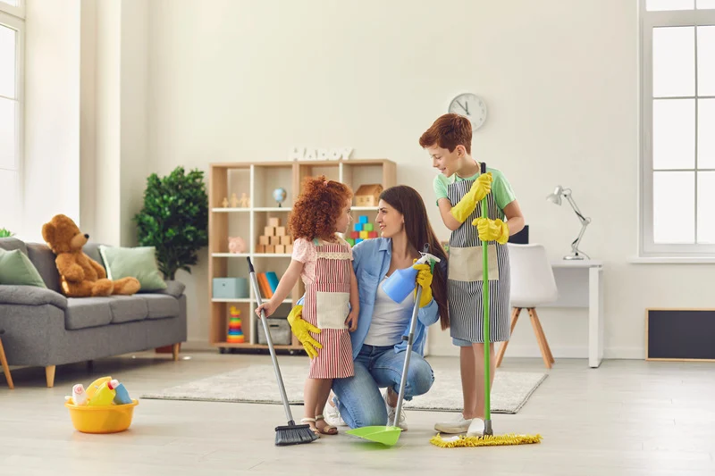 mother-and-children-doing-spring-cleaning-at-home