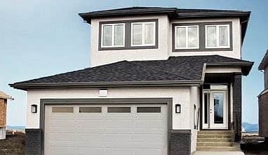 New built two-storey home with attached garage.