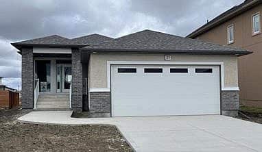 New built bungalow with attached garage.