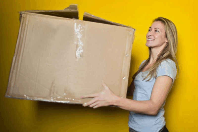 Woman holding a box