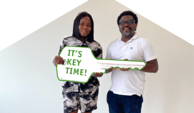 Key Time -Happy couple celebrating receiving keys to their new home - The Artha