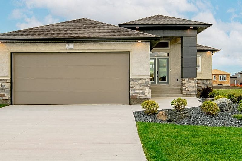 Large concrete drive way to home 